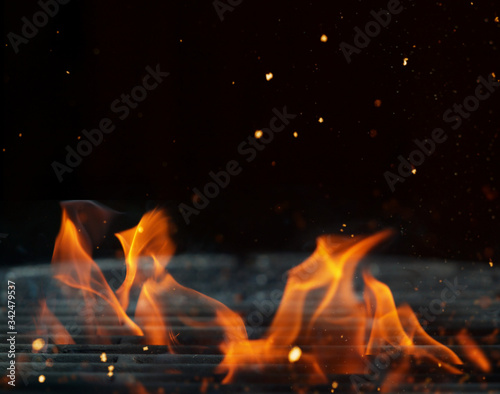 Closeup of empty grill with fire © Jag_cz