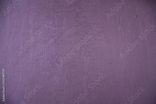 Lilac background of the misted surface. Structure. Water drops on a smooth surface.