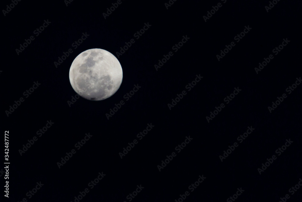 Very detailed moon in the sky on black background Very detailed moon in the sky on black background