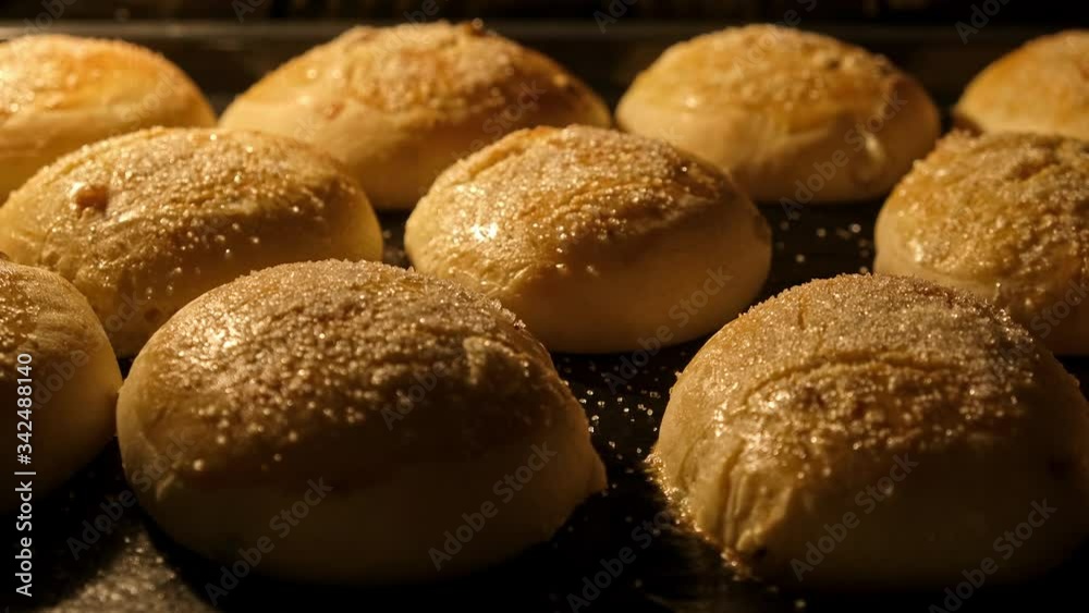 Buns backed in oven. Baking of baked goods and growth oven. Timelapse of delicious homemade buns baked. Baking concept Buns backed in oven. Baking of baked goods and growth oven. Timelapse of delicious homemade buns baked. Baking concept
