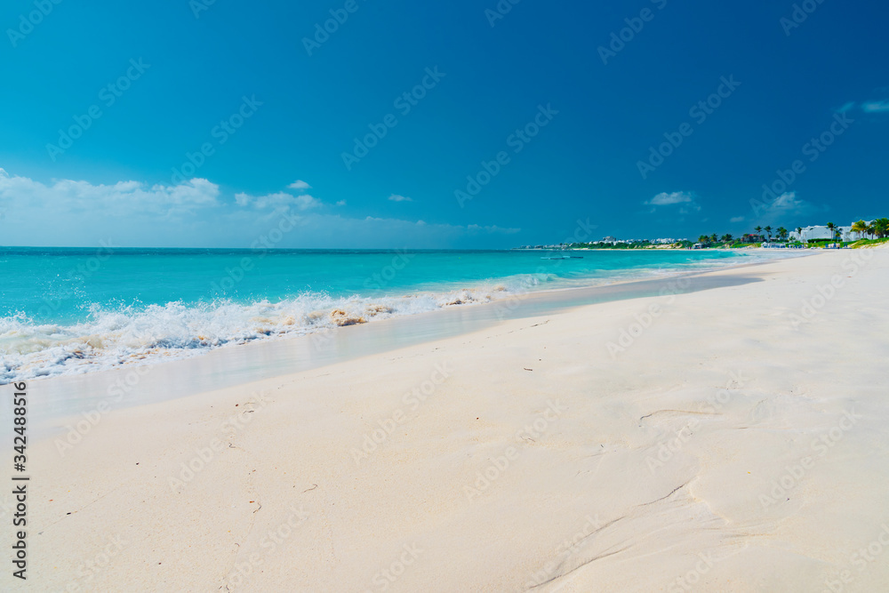 Caribbean island of Anguilla with palm trees and white beaches Caribbean island of Anguilla with palm trees and white beaches