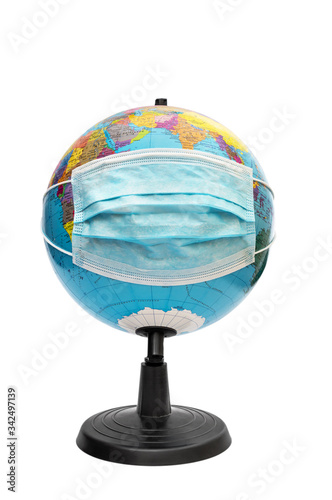 World globe with medical mask. Isolated on white. World epidemic and pandemic.