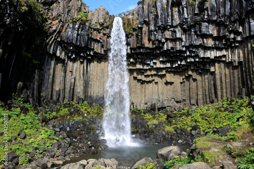 Skaftafell   Iceland - August 18  2017  The black waterfall of Svartifoss in Skaftafell National Park  Iceland  Europe