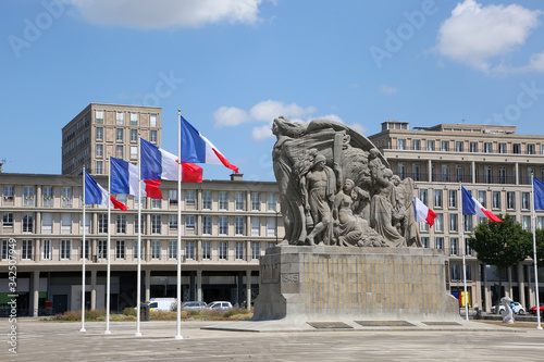 Monuments aux Morts is a monument to honor all civilians who died in the wars. It is surrounded by french flags, Le Havre, Normandy, France.