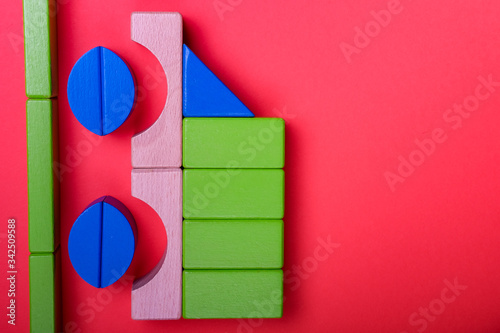 Colorful Various Shape Building Blocks Kid Toys for Playing and Educational Purpose in red, blue, oranje Isolated Background photo