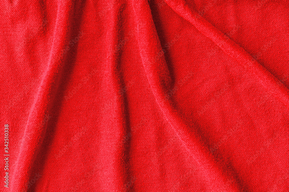 abstract background of an old red knit fabric abstract background of an old red knit fabric