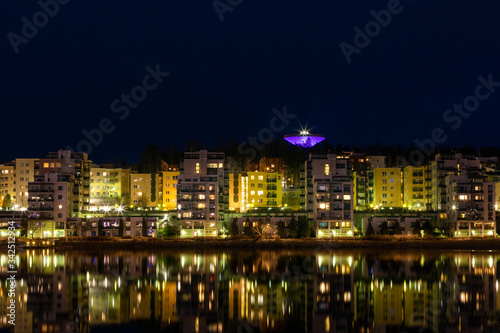 Waterfront residential buildings, still water and water reflections in Jyväskylä