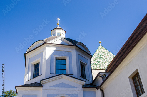 European style mountain church under blue sky