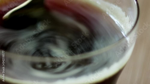 Stirring coffee close-up