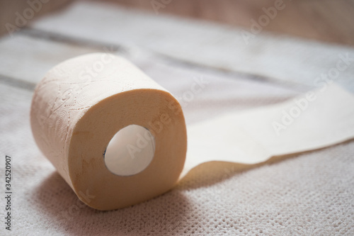 A roll of toilet paper on a towel
