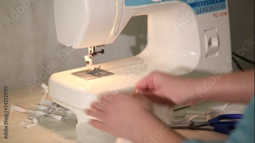 Sewing surgical medical masks. mask making. mask making.