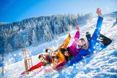 Friends Have Fun At Winter On Fresh Snow