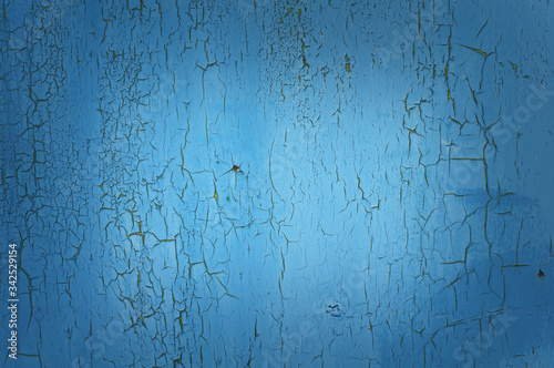 Texture with covered paint. Blue background with rust