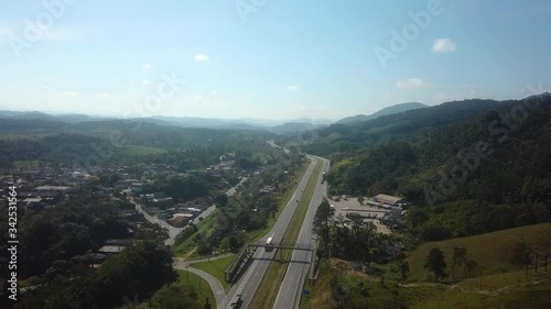 Drone aerial shot from a highway  in Sao Paulo showing cars, trucks and traffic photo