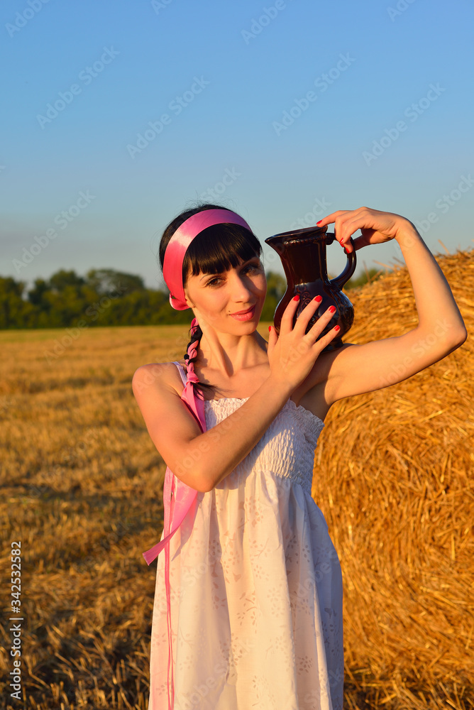 Girl with a pitcher of hay Girl with a pitcher of hay