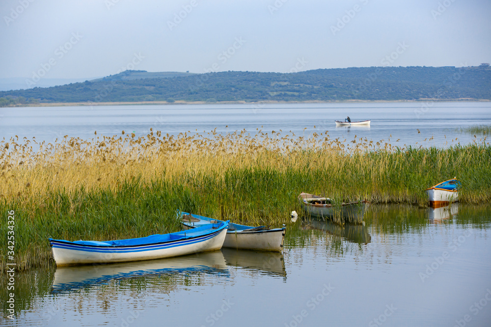 Fishing boat in blue lake  Golyazi Village of Turkey