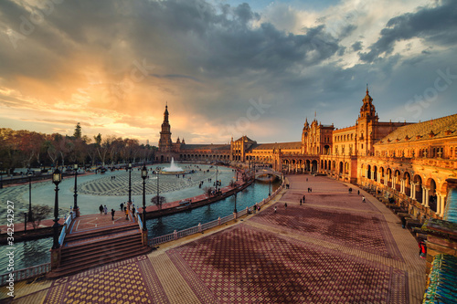 Dramatic scene of Plaza España in Seville at sunset