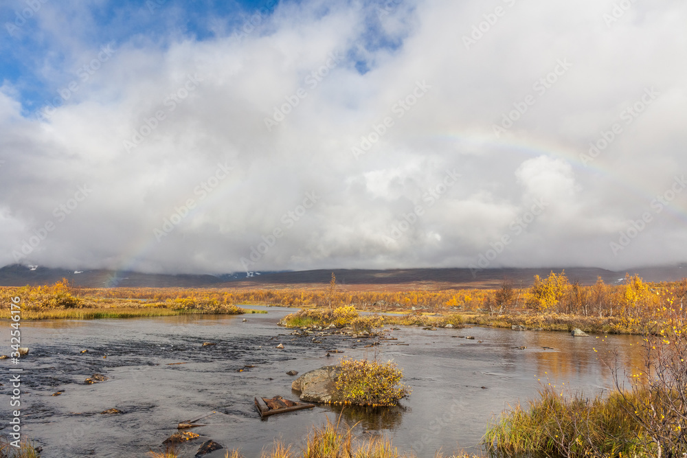 river in the Arctic mountains of a Sarek National Park.