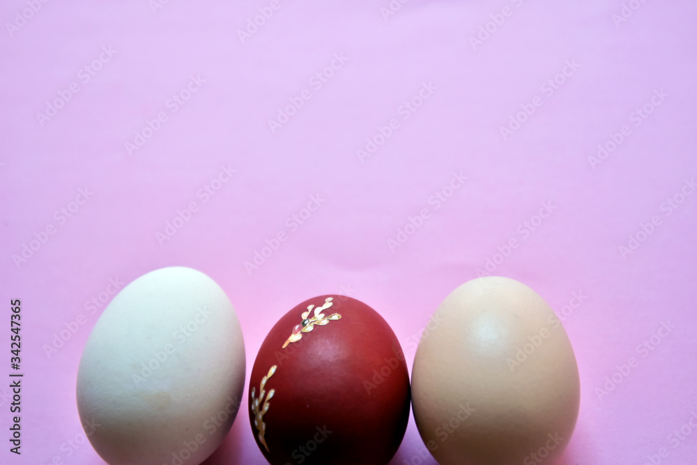 Easter eggs on pink background. Easter background.
