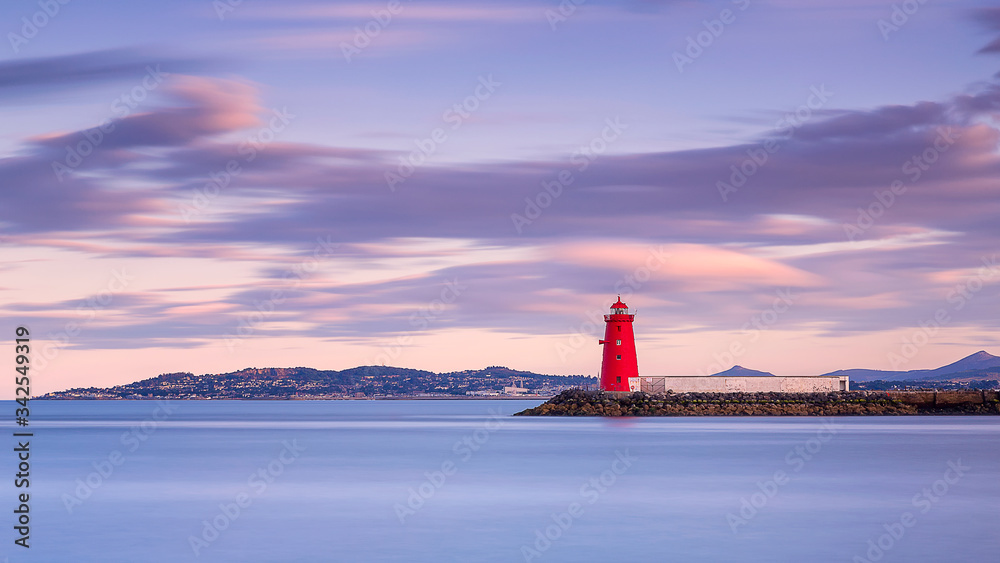 Fototapeta premium Aerial view Sunset Poolbeg lighthouse in Ireland, Dublin bay Ireland