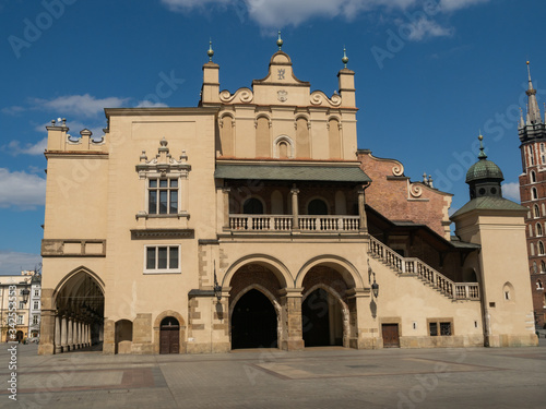  Empty of Sukiennice on empty Krakow's Main Market Square during covid-19 coronavirus pandemic.