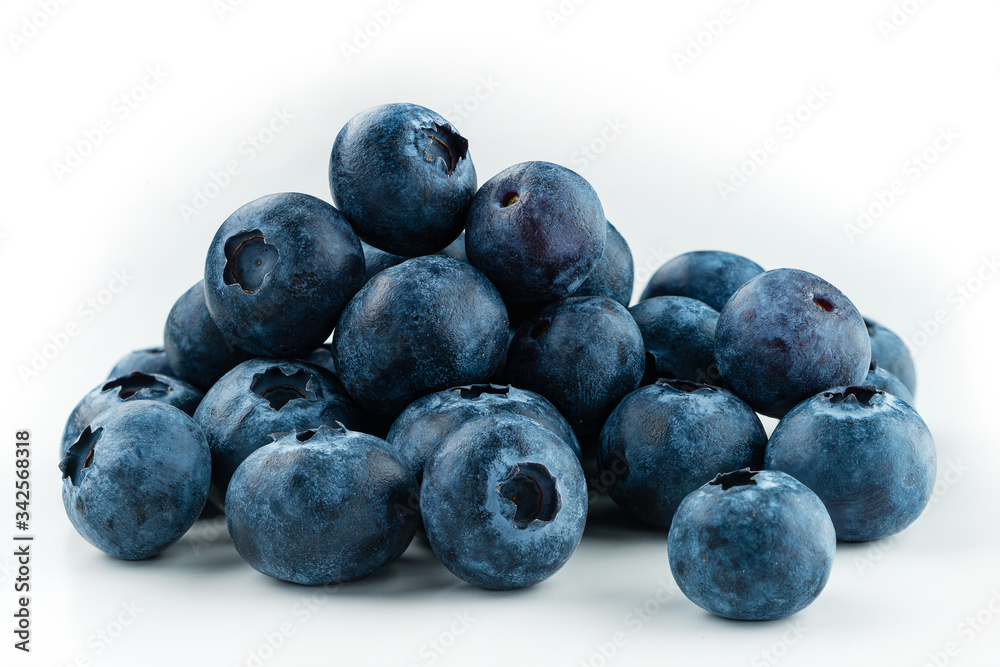 Group of fresh blueberries isolated on white background. Group of fresh blueberries isolated on white background.