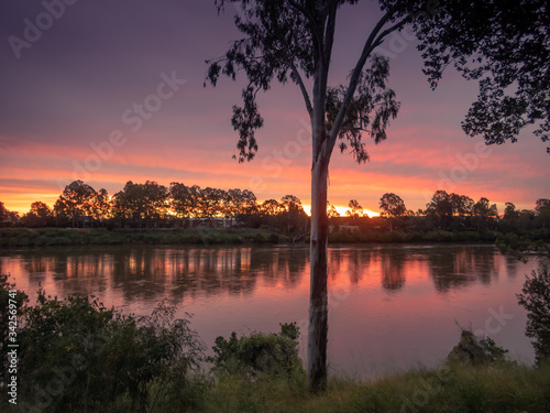 Colourful River Sunset with Reflections