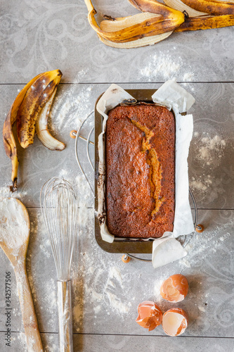 Obraz na płótnie Banana Bread with Ingredients on Grey Background w salonie