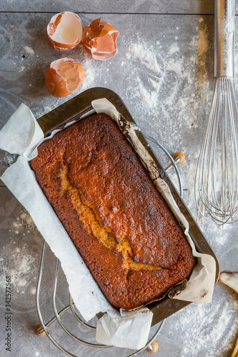 Obraz na płótnie Banana Bread with Ingredients on Grey Background w salonie