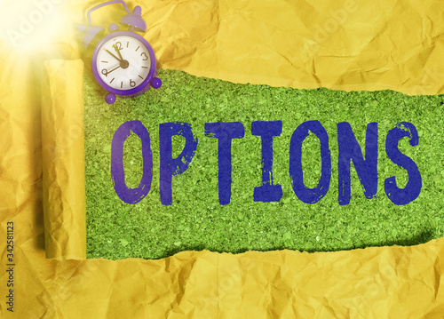 Writing note showing Options. Business concept for the opportunity or ability to choose something or to choose photo