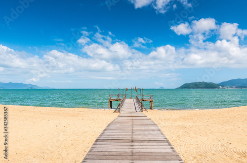 Tropical beach resort with lounge chairs and umbrellas  Nha Trang  Vietnam