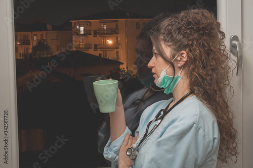 young female doctor during the coffe break