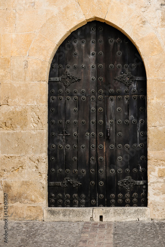 Close up of ancient doors in an old Spanish village, Spain photo