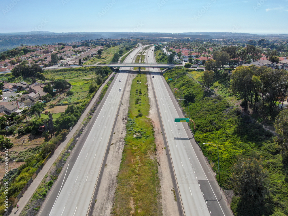 Aerial view of highway, freeway road with vehicle in movement. California, USA.