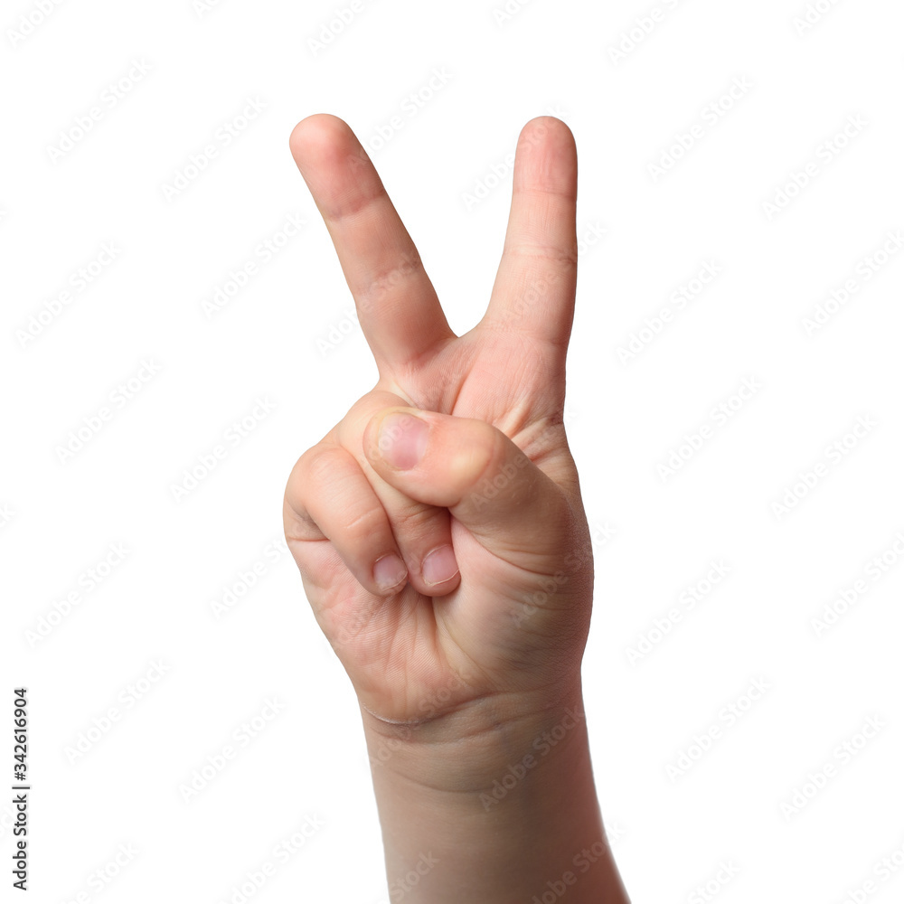 Two children's fingers. Symbol of victory. Isolated object on white background Two children's fingers. Symbol of victory. Isolated object on white background
