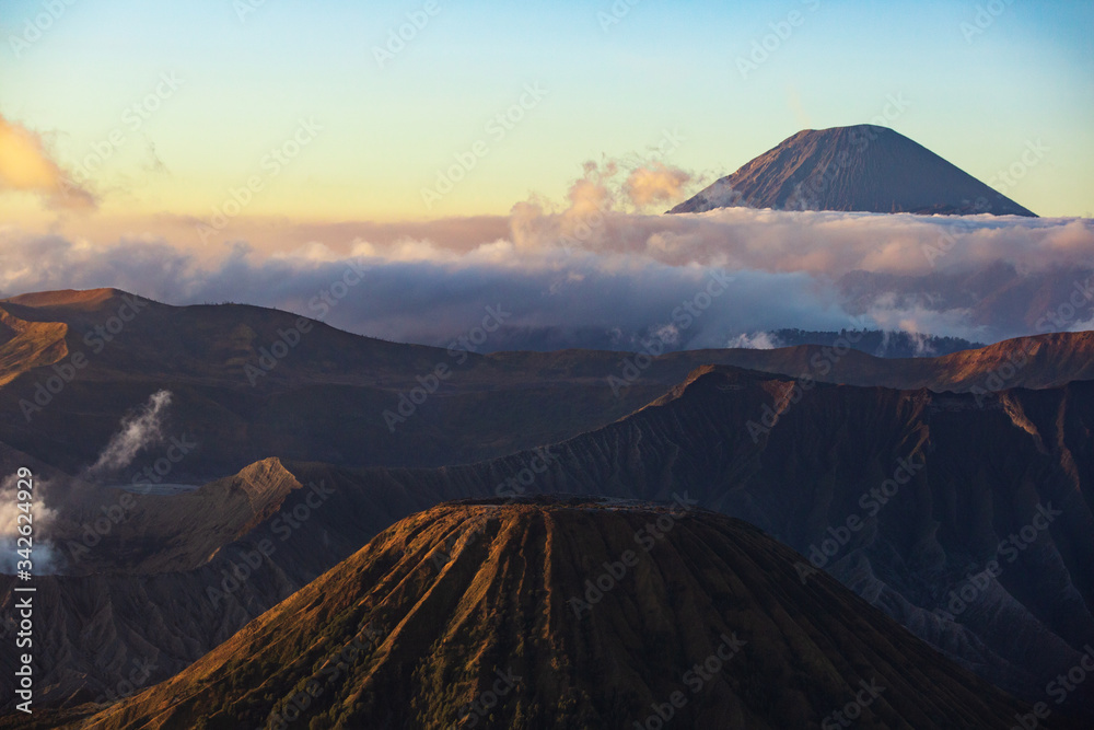 On the right side of the Bromo volcano is the Batok volcano. It is a beautiful view of Indonesia. The farthest away is the Semeru volcano.