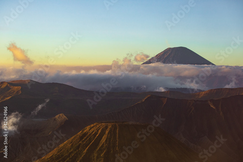 On the right side of the Bromo volcano is the Batok volcano. It is a beautiful view of Indonesia. The farthest away is the Semeru volcano.