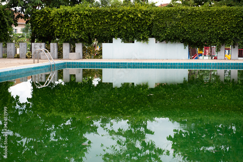 The pool is not clean due to lack of cleaning and maintenance. photo