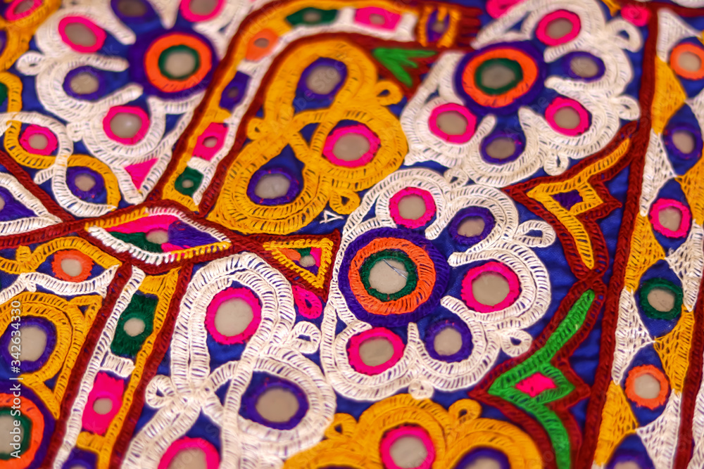 Fototapeta premium Embroidery ethnic flowers neck line flower design close view,traditional Hungarian matyo embroidery motifs.handmade indian embroidery