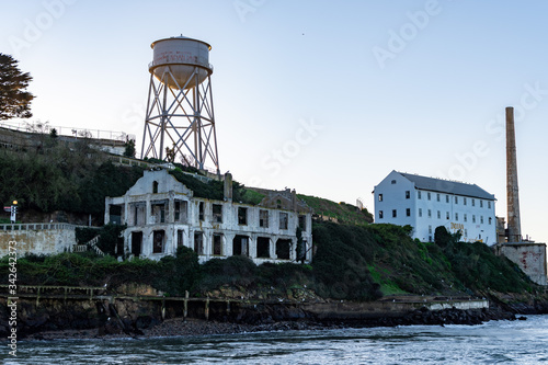 Post exchange officers club, water tower and storehouse warehouse at Alcatraz Island Prison, San Francisco California USA, March 30, 2020