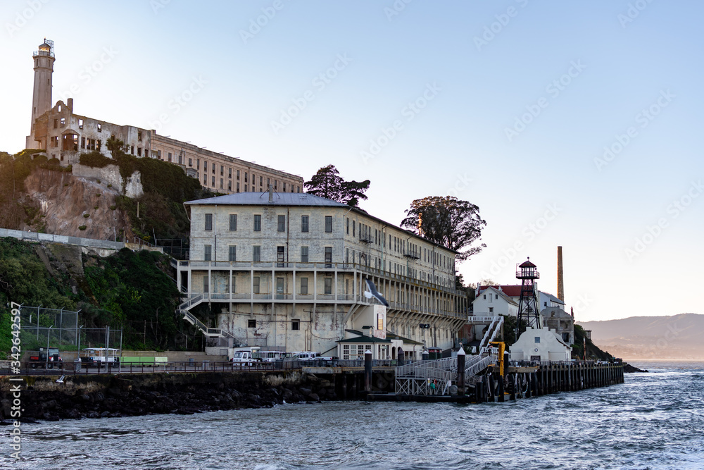 Lighthouse, barracks apartment and shipdock  at Alcatraz Island Prison, San Francisco California USA, March 30, 2020