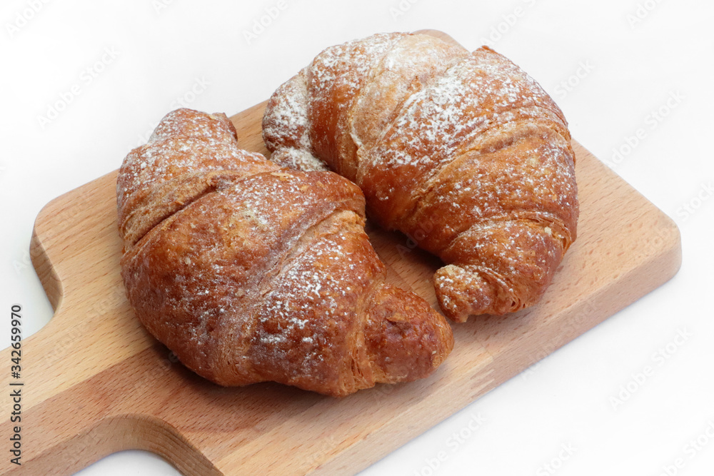croissant on a wooden table