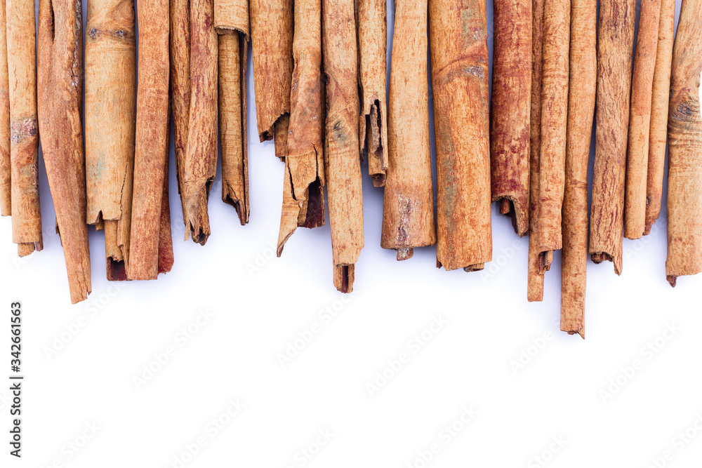 cinnamon on white background. cinnamon on white background.