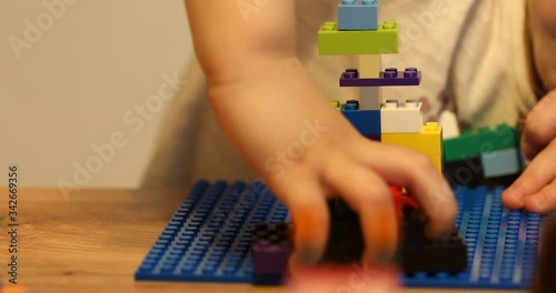 Covid-19 Coronavirus and Learning from home. Little girl online learning and creating at home. Quarantine and Social distancing concept.