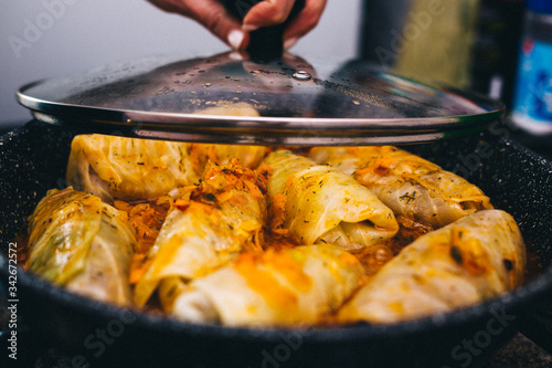 Stuffed cabbage is cooked in a pan, orange color