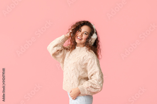 Young woman in warm sweater...