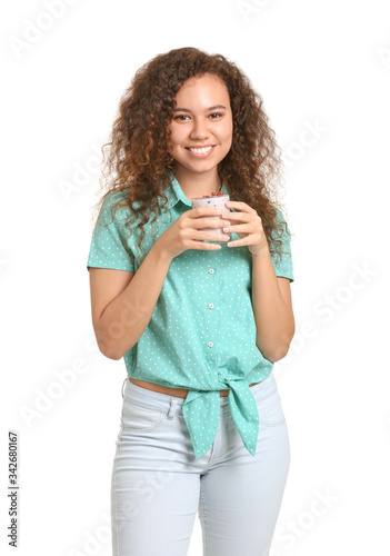 Young woman with tasty yogu...