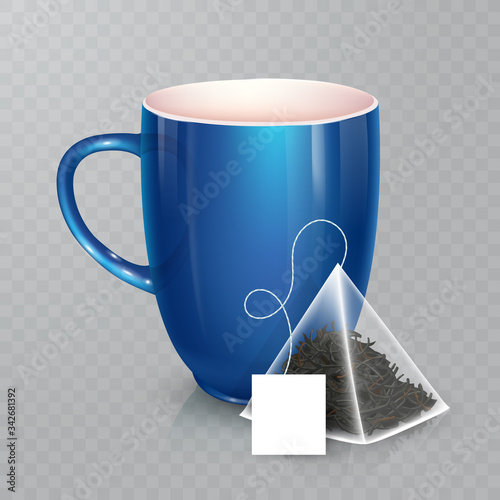 Vector cup for tea or coffee. Ceramic cup isolated on transparent background. Realistic pyramidal tea bag with label.