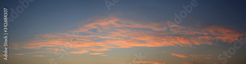 Abstract orange clouds at sunset sky background. Panorama style background