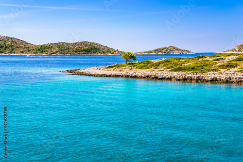 Croatian coast of rocky beach. Island in the sea, Croatia. Mediterranean scenery, Croatia, vacation travel concept.
